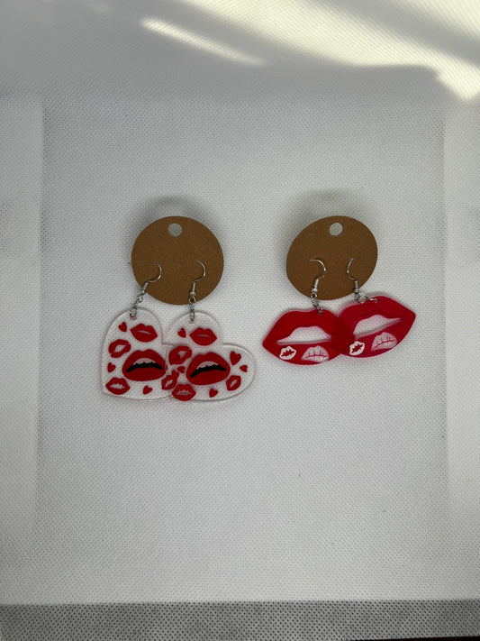 Kiss Dangly Earrings