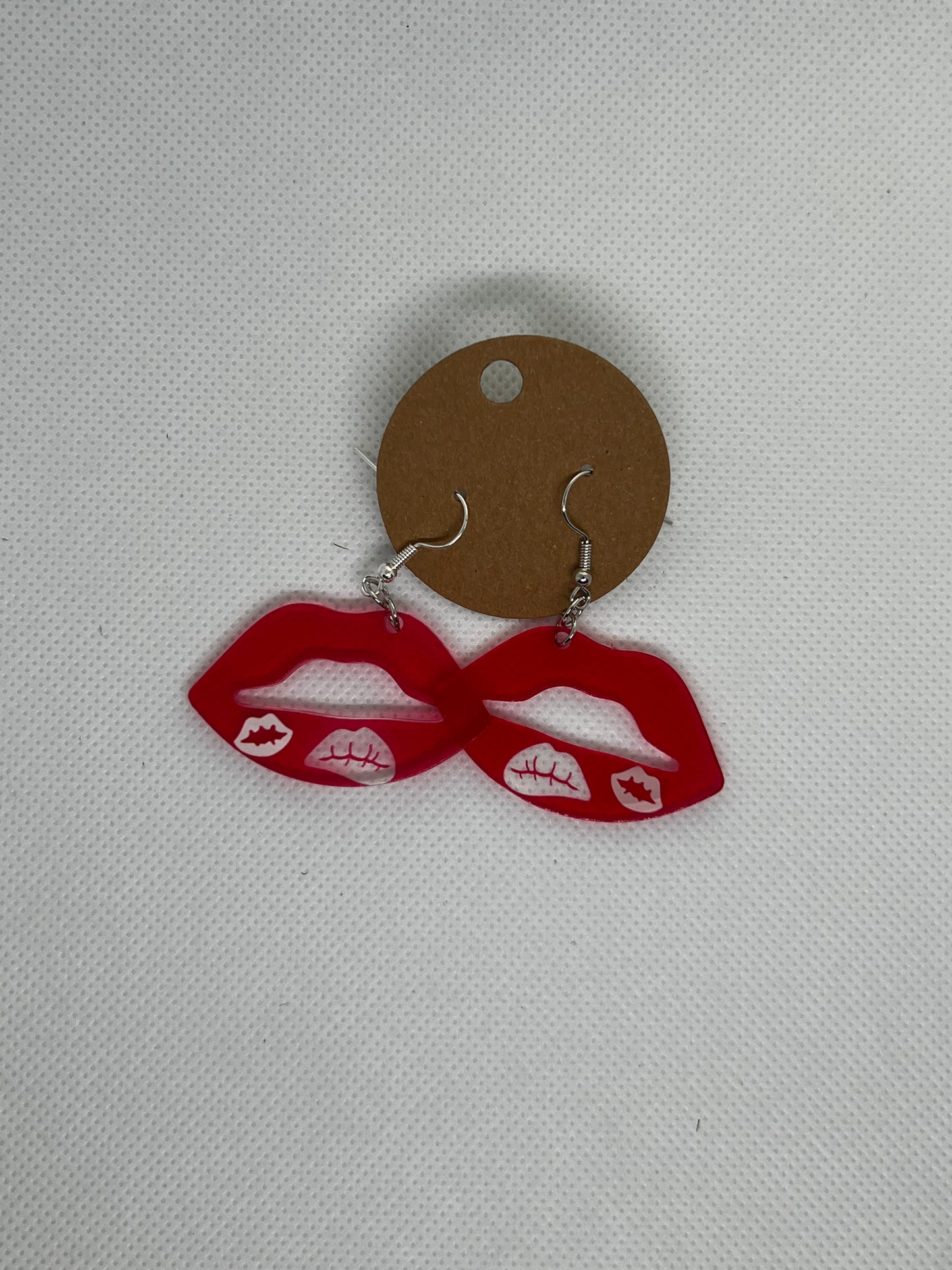 Kiss Dangly Earrings